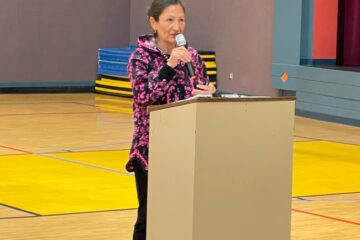 U.S. Interior Secretary Deb Haaland speaking during presentation at King Cove School.